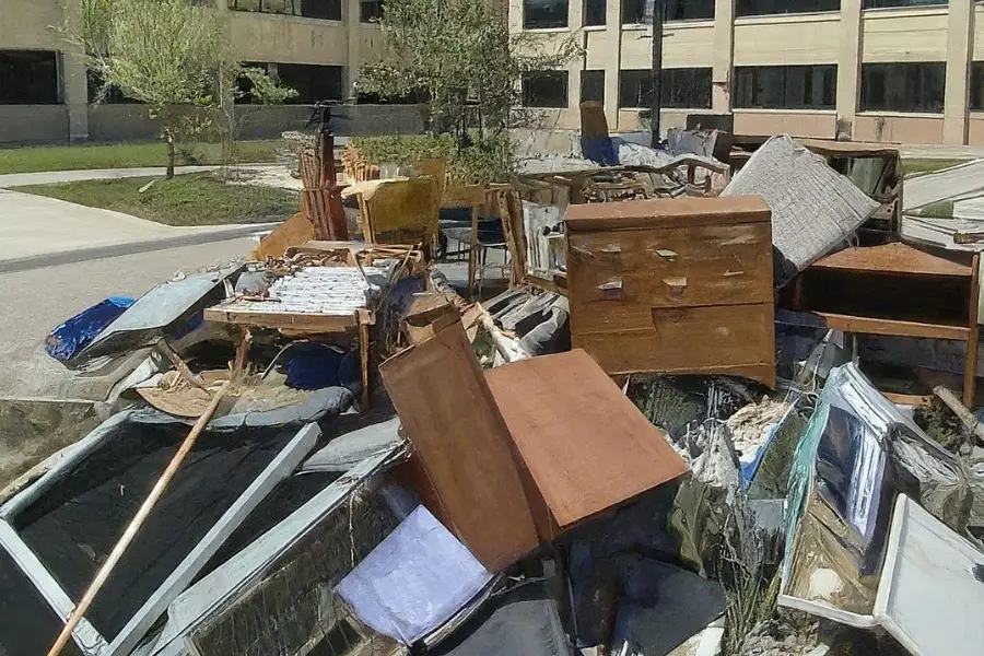 High School campus in Riverside County with junk, furniture, desks that needed a clean out service.
