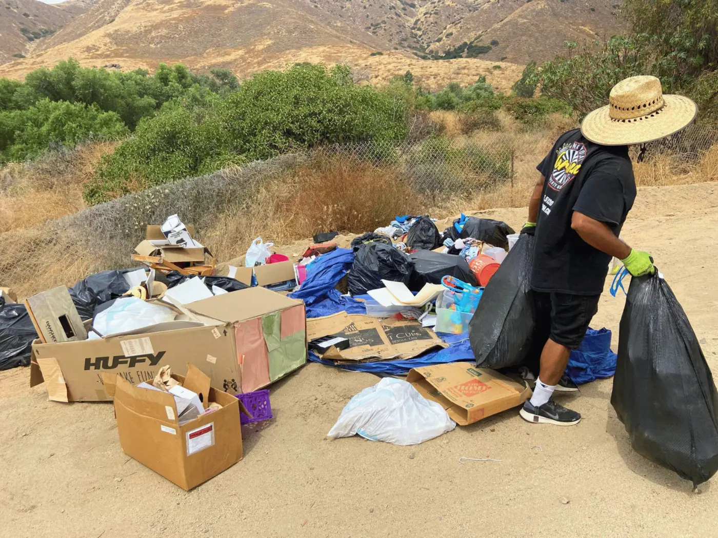Corona Junk Removal crew completing a residential property cleanout